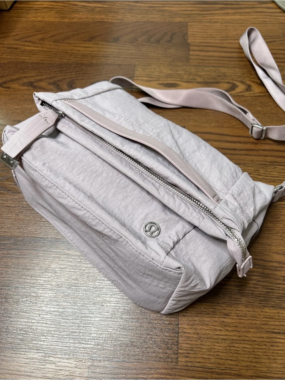 Lululemon On My Level Crossbody Bag in a light purple shade